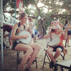 Our good friend and Deering artist Ashley Campbell, of Victoria Ghost came down and joined us in St. Augustine. Here she is giving a lesson to a young lady, bit by the banjo bug, who didn’t want to put it down!