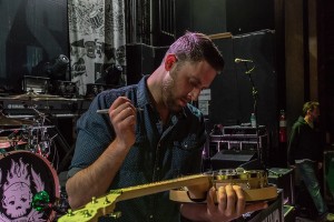 Tim Brennan with the banjo to win